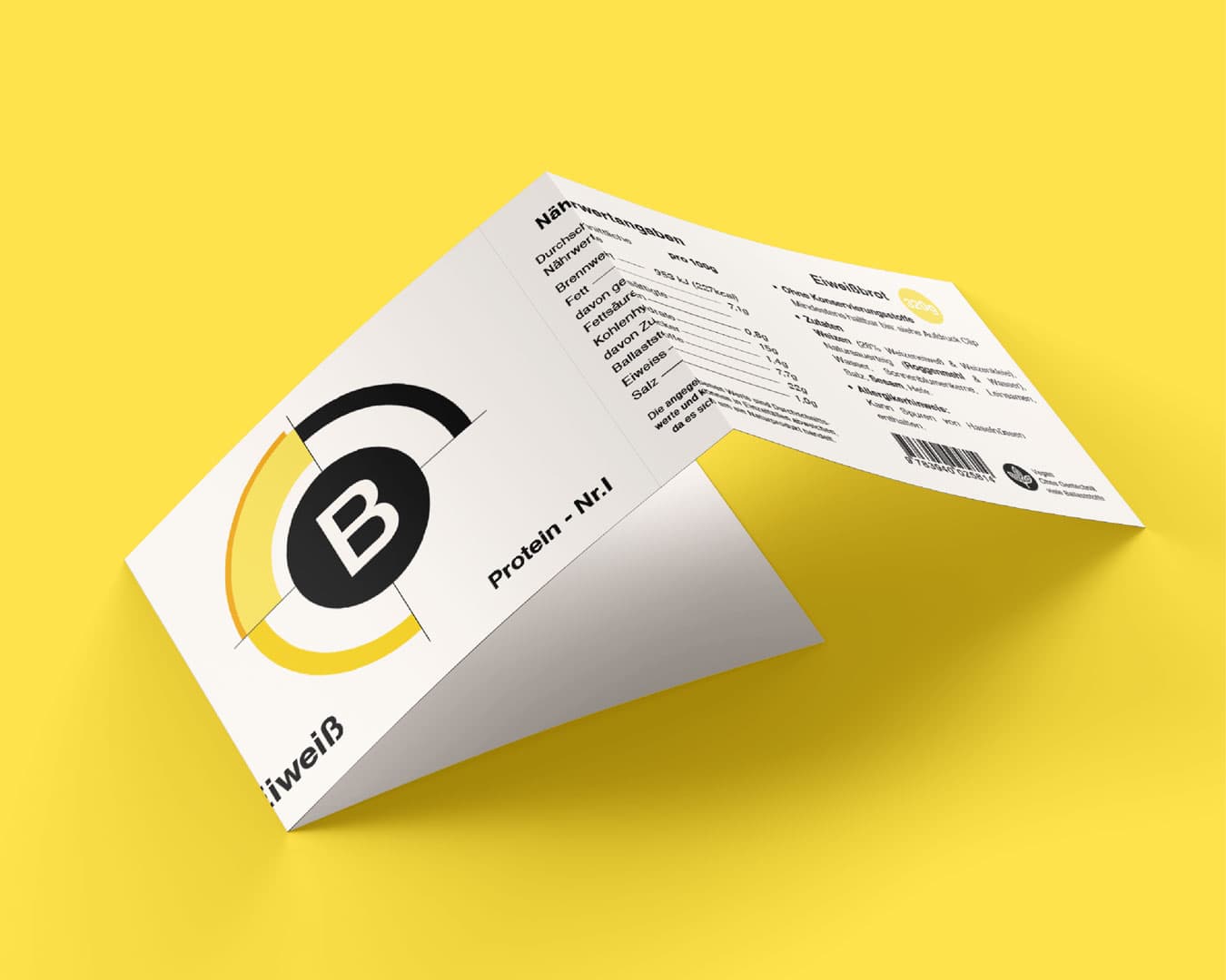 B. Just Bread Banderole für Eiweißbrot mit geometrischem B-Logo auf gelbem Hintergrund